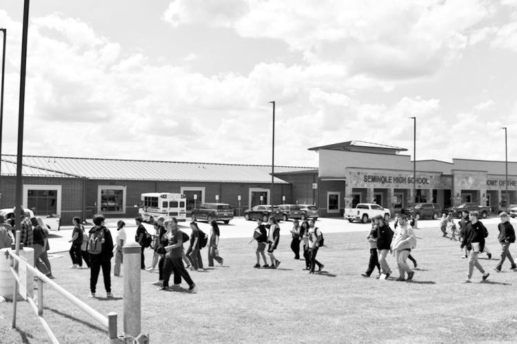 Seminole High School students evacuated the building early Thursday afternoon after a handwritten bomb threat was discovered in a girls’ restroom. Students returned to class about an hour after the evacuation. —Staff Photo by Andy Wilson
