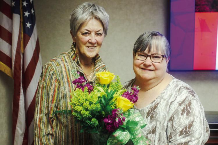 Chair of the SSC Board of Regents Marci Donaho (left) congratulates retired Associate Professor of Sociology Tracy Jacomo on receiving emeritus status following the meeting on March 26. —SSC photo
