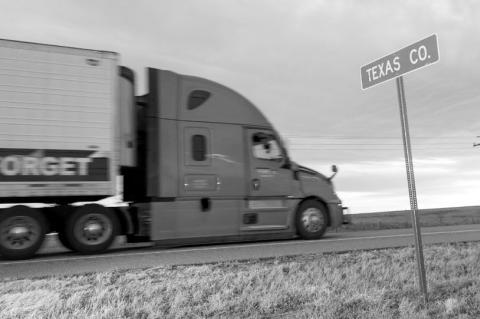 A big rig enters Texas County on Hwy. 54 on Feb. 8, 2025. (Brent Fuchs/Oklahoma Watch)