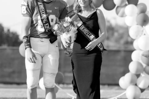 Bowlegs Homecoming King Camden Morgan and Queen Gracie Taylor pose together on the field after coronation ceremonies Friday night, Oct. 3. It was a sweet homecoming for Bowlegs, as the football team defeated Graham-Dustin by a score of 52-6. —Photo by G