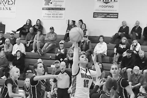 Varnum Lady Whippet Alyviah Lena goes up for the basket Tuesday night. Staff Photo by Andy Wilson