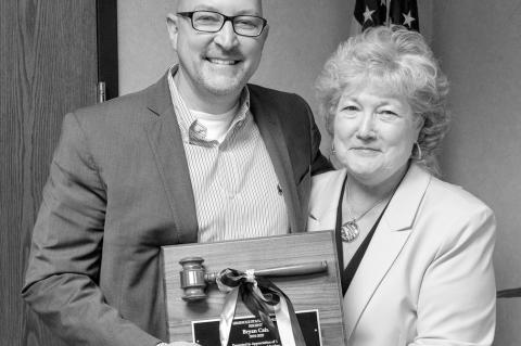 SSC Board of Regents member Bryan Cain (left) was recognized for his service to the College at the meeting on June 9. Following the meeting, President Lana Reynolds (right) presented him with a plaque and gavel, commemorating his time at the College. (SSC