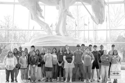 Seminole State College President’s Leadership Class students pose Feb. 10 at the National Cowboy and Western Heritage Museum in Oklahoma City in front of “The End of the Trail,” one of the museum’s most iconic sculptures, during a leadership and c