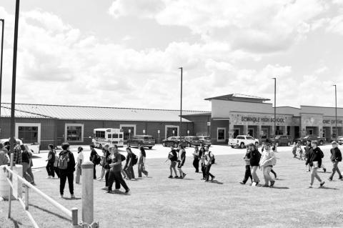 Seminole High School students evacuated the building early Thursday afternoon after a handwritten bomb threat was discovered in a girls’ restroom. Students returned to class about an hour after the evacuation. —Staff Photo by Andy Wilson