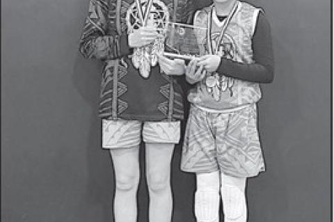 Supreme Nation teammates Lakota Tilley (left) and Aaliyah Ragoebar (right) help win the Oklahoma State Invitational Tournament in March. Both girls attend Varnum schools and are in the 6th grade. Courtesy Photo