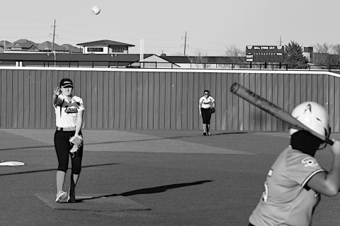 Konawa Lady Tiger pitcher Kadie Jencik throws the pitch to the waiting Seminole batter. Staff Photo by Andy Wilson