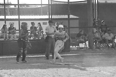 Maud Lady Tiger Abba Horton scores the run against Macomb Friday night. Staff Photo by Bill Anderson