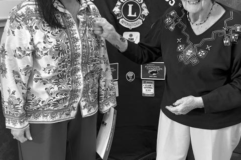 The Wewoka Lions Club welcomed new member City Manager Rebecca Stone (left) to the organization this week. She received a membership pin from Lionesses Phyllis Williamson. —Courtesy Photo