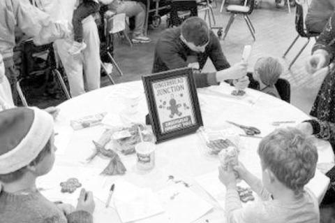 Left: Santa, The Grinch and other characters were at the “Breakfast With Santa” event on Dec. 6, hosted by Seminole High School student organizations. Below left, over 350 food items were collected at the event and donated to a local nonprofit. Below 