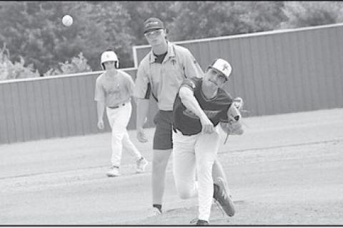 Varnum Whippet Ryan Poull winds up for the pitch against the Stuart Hornets baseball scrimmage Wednesday. Staff Photo by Bill Anderson