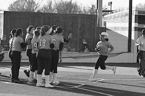 Seminole Lady Chieftain Morgan Gamble comes into home plate for the score Friday evening. Staff Photo by Andy Wilson