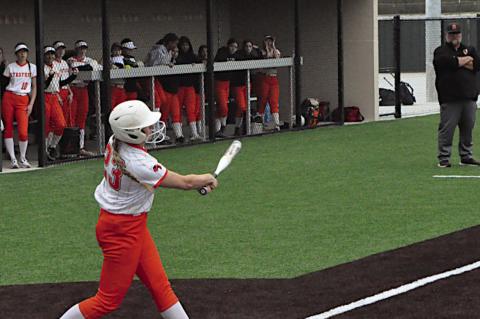 Strother Lady Yellowjacket Emily Echelle knocks one out to the outfield. Staff Photo by Bill Anderson