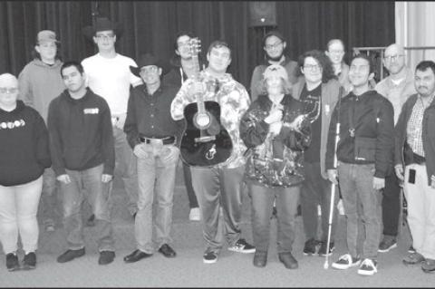 Country Singer Entertains, Donates Guitar at School For The Blind