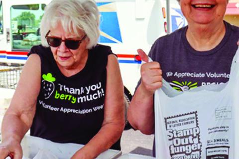 Regional Food Bank volunteers help sort donated food during the Stamp Out Hunger Food Drive on Saturday, May 10. (photo courtesy Regional Food Bank of Oklahoma/ Jarrod Ferguson)