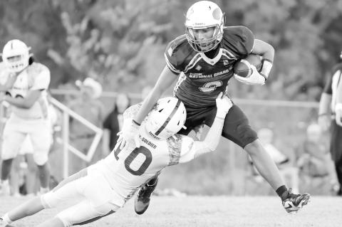 A Bowlegs defender tries to bring down Sasakwa Viking Sherman Mitchell Jr. Friday night. Courtesy Photo by Glen Bryan