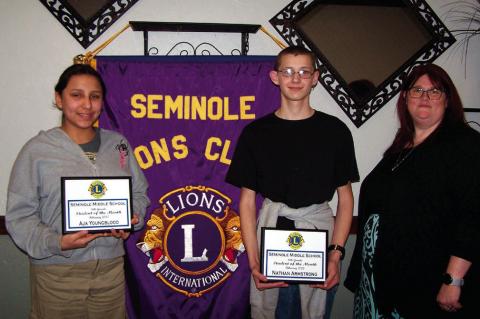Top photo: Kaylee Moore and Angel David Benitez Casas, the Rotary Students of the Month with Rotarian Mitch Enos. Above: Lions Students of the Month Aja Youngblood and Nathan Armstrong with Lions member Amy Bagwell. (SPS photos by Ginger Cummmins)