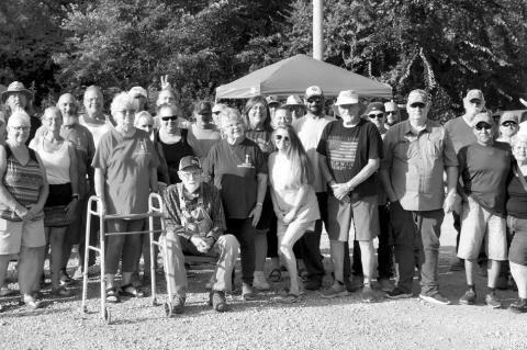 Vendors at Highway 9 Antiques gather for a group photo Saturday morning, Aug. 9 as the market celebrated its 8th anniversary. The shop draws not only local visitors, but ones from all over the world. It recently welcomed visitors as far away as Bonn, Germ