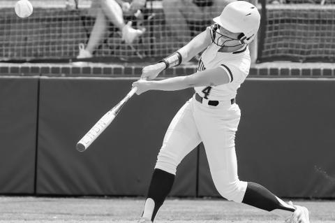 Seminole State Lady Trojan McKayla Greenshaw drives the ball into the outfield Courtesy Photo by Glen Bryan