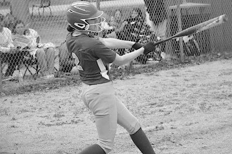 Bowlegs Lady Bison MaryBeth Dunagan gets a hold of one Thursday evening. Staff Photo by Bill Anderson