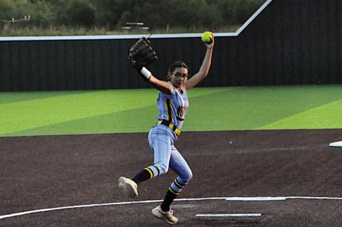 New Lima Falconette Jazzy Harjo throws the fastball to the Varnum batter Thursday night. Staff Photo by Bill Anderson