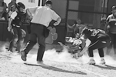 Seminole Lady Chieftain slides into home safe Friday night at Maud. The Maud Junior High softball team hosted the Seminole Junior High softball team Friday night. Seminole won 7-4. Staff Photo by Andy Wilson