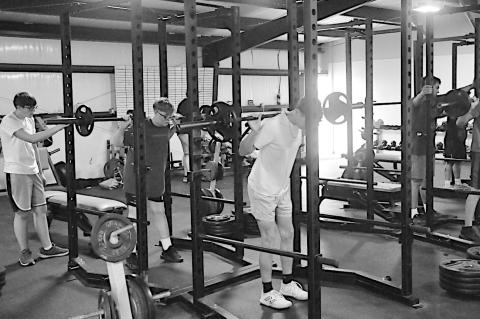 Strother Yellowjackets boys use the gym to do weight-lifting and conditioning Tuesday morning. Staff Photo by Bill Anderson