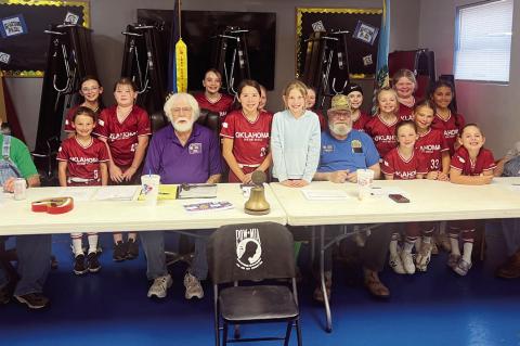 Left: The 2025 World Series softball team, The Red Dirt Rebels, surrounded the American Legion Post 204 leadership members and thanked them for their donation that helped them get to Florida for the Series. The American Legion wishes the girls good luck f