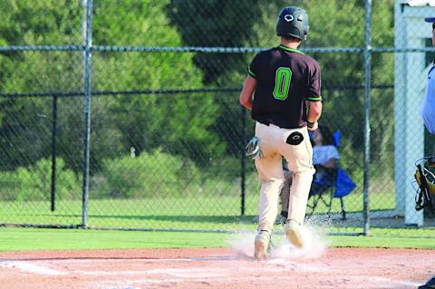 Varnum Whippet Brayden Goodwin scores a run for Varnum Thursday. Courtesy Photo by Jeanne Gosa
