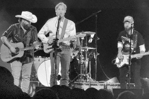Twangin’ —Photo by Brendan Neese for The Seminole Producer Above, country music star Wade Hayes (center), a native of Bethel Acres, joined the Swon Brothers onstage Thursday night at the Merle Haggard Tribute concert at the Muskogee Civic Center.