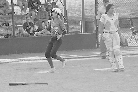 Varnum Lady Whippet Karsyn Lowery scores a run for Varnum. Staff Photo by Bill Anderson