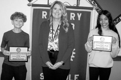 Pictured right are the Seminole Middle School Lions Students of the Month Brodie Kuehner and Dahlera Minner. Also pictured is Angela Willmett. (SMS photo by Ginger Cummins)
