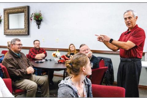 Dr. Ricky Streight visits with attendees during a retirement reception in his honor Dec. 3 in the E.T. Dunlap Student Union on the Seminole State College campus. Streight has dedicated 18 years of service to SSC over two tenures, beginning in 1986 as an i