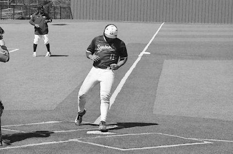 Seminole State Trojan Hunter Dearman scores the run Thursday afternoon against Connors State. Staff Photo by Bill Anderson