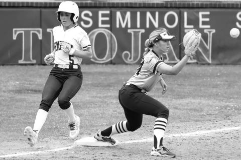 Seminole State Lady Trojan Camryn Westbrook beats the throw to first base. Courtesy Photo by Glen Bryan