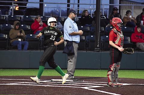 Varnum Lady Whippet Miley Wildcat scores a run Monday evening. Staff Photo by Andy Wilson