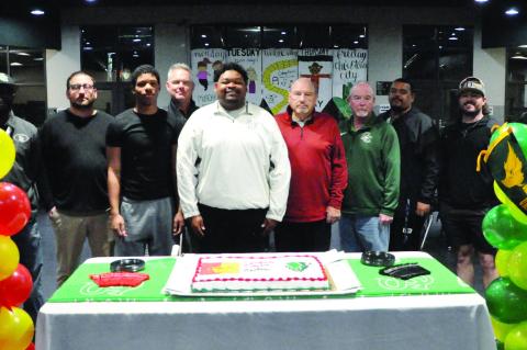 Seminole Football had 2 signings Wednesday. Dontre Garfield signed his letter of intent with Pittsburg State and Martez Johnson signed his letter with OBU. Pictured is Dontre and Martez with Seminole High School coaches. Staff Photo by Bill Anderson