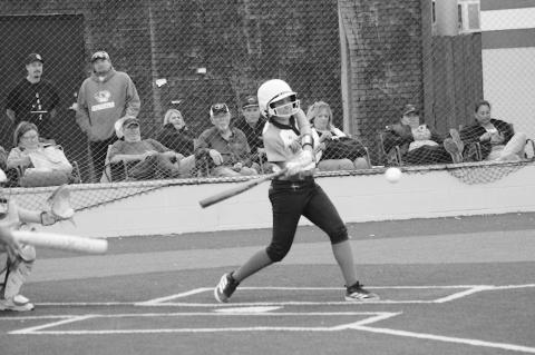 Courtesy Photo by Jeanne Gosa Varnum Lady Whippet Jenna Lofton hits the ball to the outfield Friday evening.