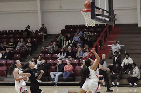 Seminole State Belle Nazhoni Sleeper flies in for the layup Monday night. Lady Belles won 105-47. Staff Photo by Bill Anderson