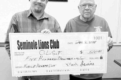 The Seminole Lions Club this week approved pledging $500 per year to support the Oklahoma Lions Service Foundation’s Mobile Health Screening Unit. Pictured is Lions President Mark Lewin presenting Les Walker, a former president of the Oklahoma Lions Ser