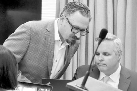 Epic Charter School co-founders David Chaney, left, and Ben Harris, right, attend a preliminary hearing Wednesday at the Oklahoma County Courthouse in Oklahoma City. (Photo by Nuria Martinez-Keel/Oklahoma Voice)