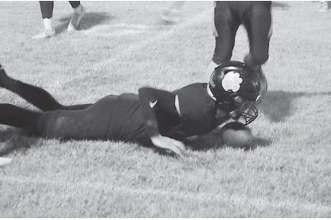 Maud Tiger Quarterback Trenton Marshall punches the ball in for the touchdown Friday night against the Bluejacket Chieftains. Maud won 46-28. Staff Photo by Andy Wilson