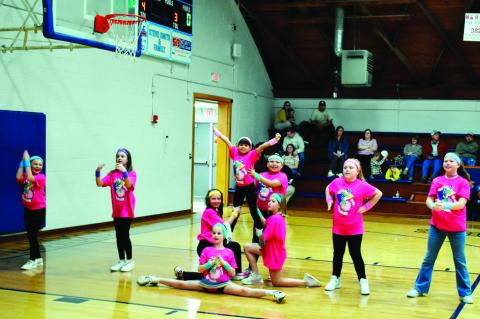 New Lima Elementary Students perform at half time of the boys’ basketball game Thursday, Feb. 6. (Staff photo by Andy Wilson)