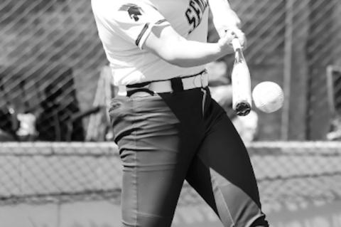 SSC Lady Trojan Mckenzie Kauk delivers a base hit. Photo by Glen Bryan