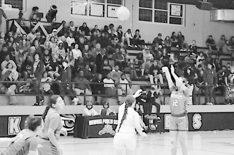 Varnum Lady Whippet Alyviah Lena shoots from top of the key Tuesday night. Staff Photo by Bill Anderson