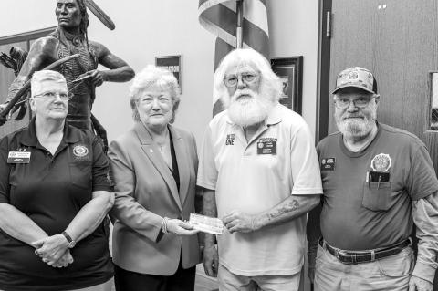 Seminole American Legion Post 204 members presented a donation to Seminole State College on Oct. 9 in support of the College’s upcoming Veterans Day activities. Pictured (from left): Sequeeta Potter, SSC President Lana Reynolds, Post Commander Carl Odom