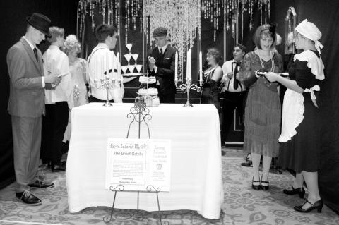 Bowlegs students, dressed as characters from The Great Gatsby, pose in perfect stillness for the judges to view their scene from the novel by F. Scott Fitzgerald. The enactment was part of a competition at the Oklahoma State Beta Convention held earlier t