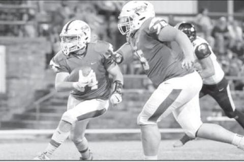 Bowlegs Bison Kayden Presley heads for the endzone as Sawyer Kings helps block. Courtesy Photo by Glen Bryan