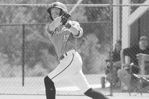 Courtesy Photo by Jeanne Gosa Varnum Whippet Chance Winsett knocks the ball to the outfield Monday afternoon
