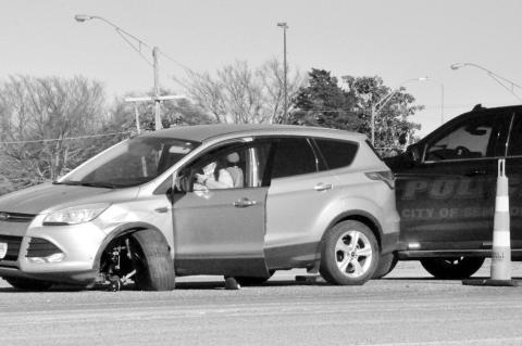 No injuries were reported, but two vehicles sustained extensive damage in a two-vehicle accident late Tuesday afternoon at the Harvey Road/Highway 270 interchange. The vehicle pictured at left was rendered undrivable in the crash, as its left front wheel appeared to have been separated from the axle. The other car involved suffered front end damage (right photo).