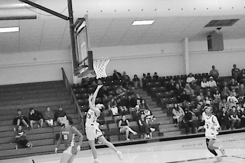 Seminole State Lady Belle Alona Cooper-Rochovitz flies in for the layup Monday night. Staff Photo by Bill Anderson